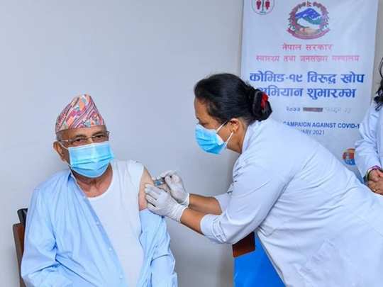 KP Sharma Oli Nepal PM KP Sharma Oli takes Covishield vaccine            - Navbharat Times