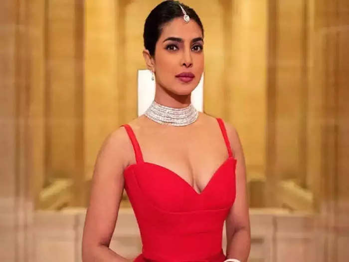 actress priyanka chopra jonas wore hot and bold red ball gown for her wedding function