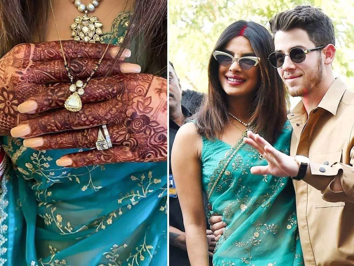 priyanka chopra mangalsutra: priyanka chopra bvlgari mangalsutra is elegant  and chic - शादी के 2 साल बाद प्रियंका चोपड़ा के गले में नजर नया मंगलसूत्र,  हीरा-काले मोती और सोने को ...