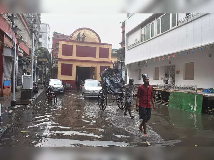 Kolkata: A Durga Puja pandal submerges in water after rain ahead of the Durga Pu...