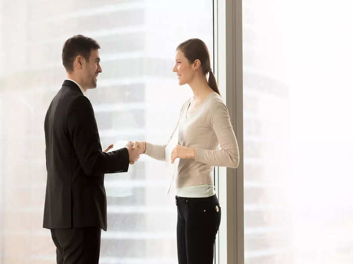 female-company-secretary-meeting-client-office