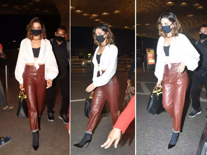 deepika padukone looks stylish in faux leather pants-white blouse black bralette for her airport look