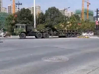 Video: तीसरे विश्व युद्ध की आहट! ट्रकों में विनाशकारी टैंक ले जा रही चीनी सेना, ताइवान के खिलाफ जंग की तैयारी? 