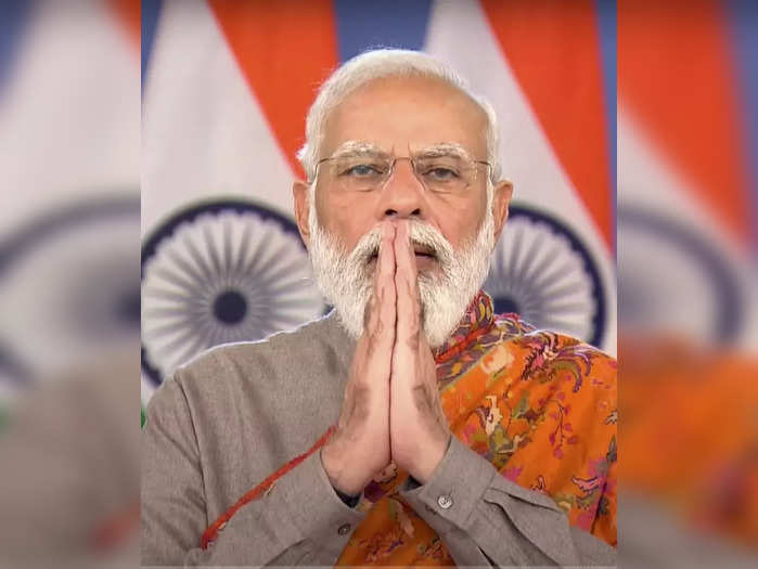 **EDS: TV GRAB** New Delhi: Prime Minister Narendra Modi gestures during his add...