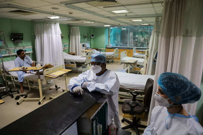 Healthcare workers are seen inside a ward for coronavirus disease (COVID-19) patients at Sir Ganga Ram Hospital in New Delhi Healthcare workers are seen inside a ward for coronavirus disease (COVID-19) patients at Sir Ganga Ram Hospital in New Delhi