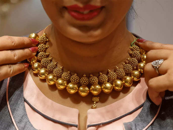 gold price today: gold tumbles rs 302, silver declines rs 81