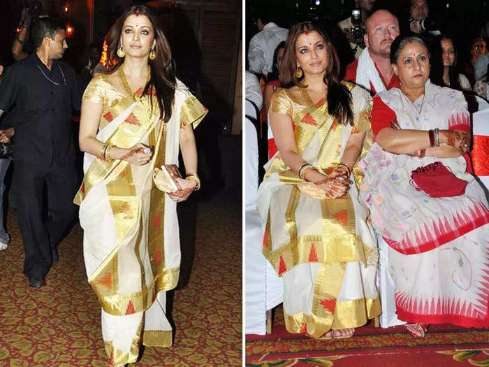 aishwarya rai bachchan in gold green saree with hubby abhishek bachchan for khelein hum jee jaan sey premiere