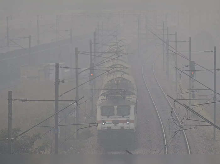 Ghaziabad: A train runs on a railway track in Fog (File Photo)