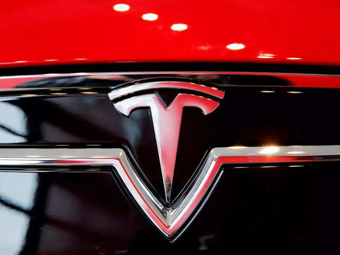 FILE PHOTO_ A Tesla logo on a Model S is photographed inside of a Tesla dealership in New York.