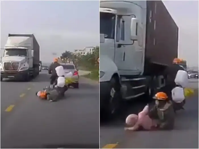 mother saved son in road accident video goes viral from vietnam mother saved son in road accident video goes viral from vietnam