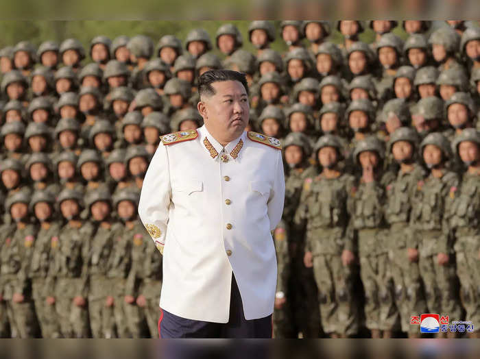 North Korean leader Kim Jong Un meets troops who have taken part in the military parade to mark the 90th anniversary of the founding of the Korean People&#39;s Revolutionary Army