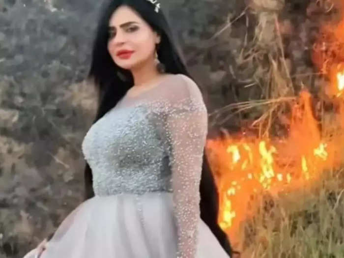 tiktoker dolly humaira asghar poses by forest fire sparks outrage on social meida