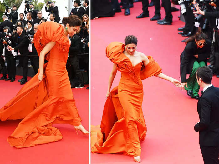 deepika padukone in orange custome made trail gown at cannes red carpet photos