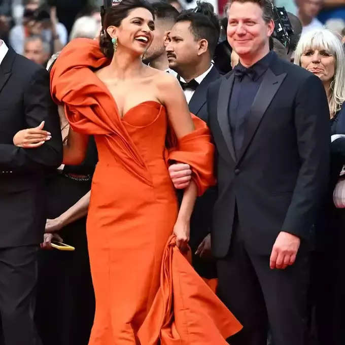 Deepika Padukone at cannes 2022 orange gown