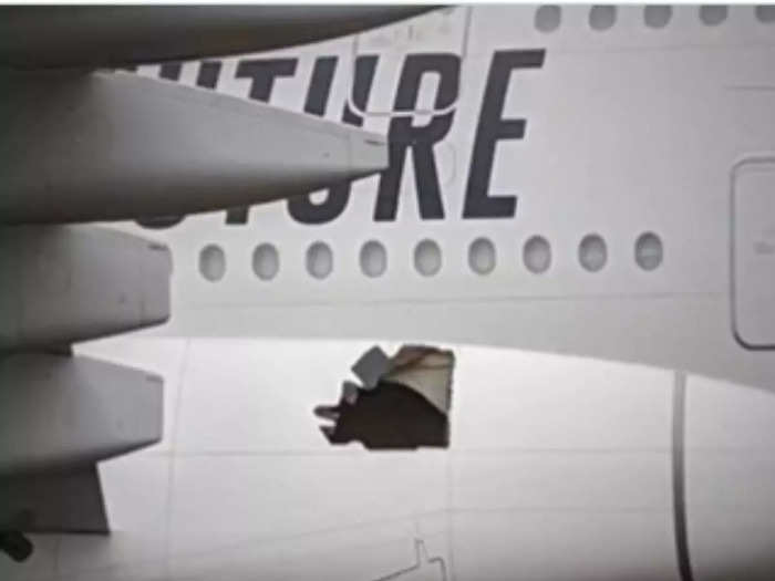 Footage shows hole in Emirates plane after safe landing in Brisbane
