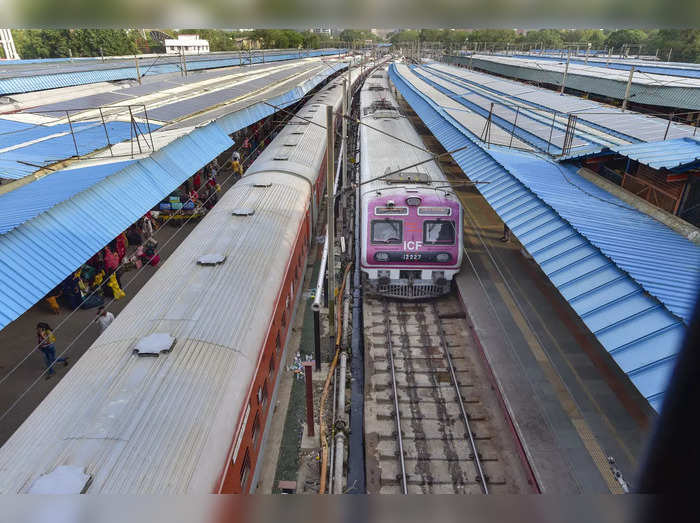 Passenger trains at New Delhi Railway Station. Indian Railways decide...