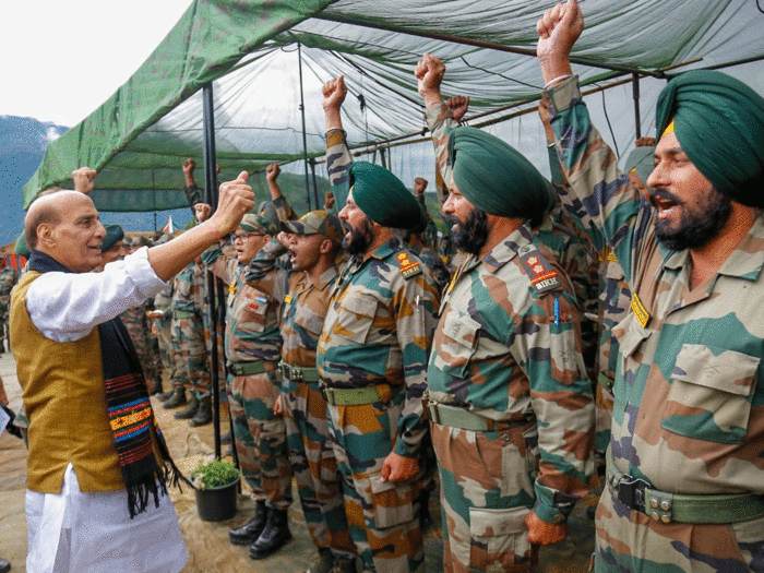 Indian Army personnel at Dinjan, Assam with Rajnath singh