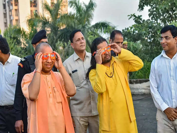 cm yogi adityanath in gorakhpur watch solar eclipse 2022 see photos