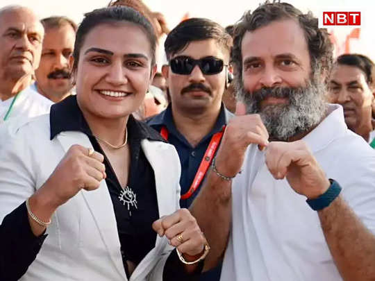 राहुल गांधी के साथ मुक्‍केबाजी के पोज में यह लड़की कौन है? 