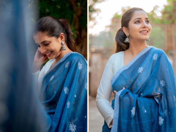 Jhumkas, cheekbones, and smile sarees add charm to Sanjeev's saree. | Hits Times 97027259 | Hits Times