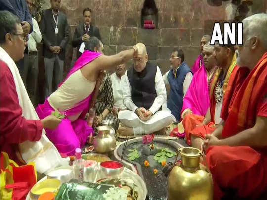 Jharkhand: केंद्रीय गृहमंत्री Amit Shah ने पत्नी संग बाबा बैद्यनाथ मंदिर में पूजा-अर्चना की, देखिए तस्वीरें 